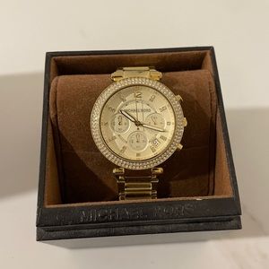 Gold Michael Kors watch in good condition